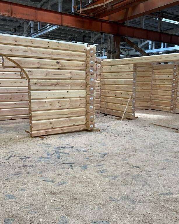 Blockhaus Manokin Erdgeschoss Küche Wohnzimmerbogen