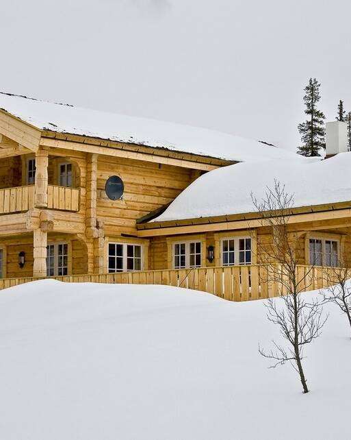 Blockhaus natur mit großer Terrasse und Balkon